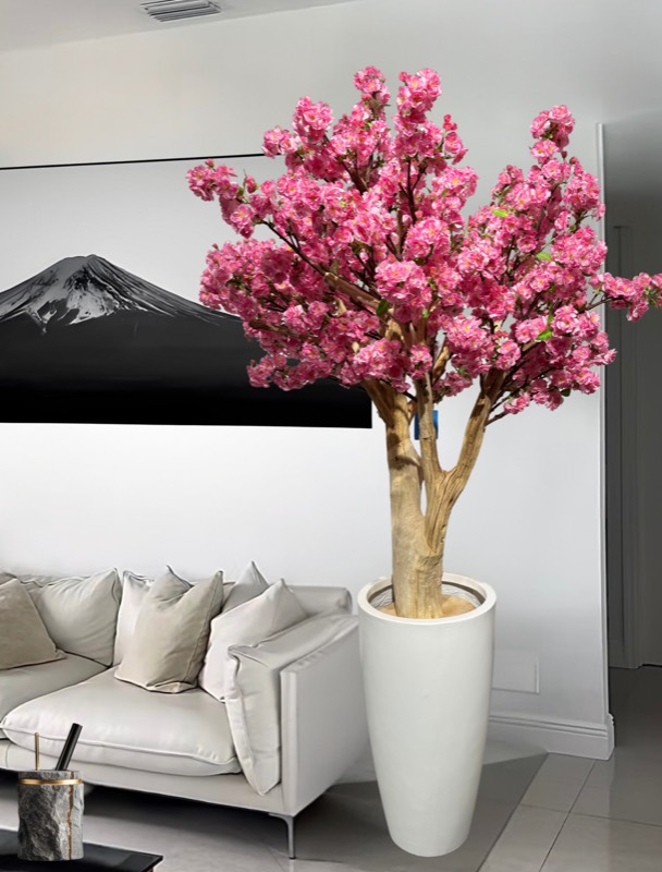 Pink cherry-blossom tree in a modern living room